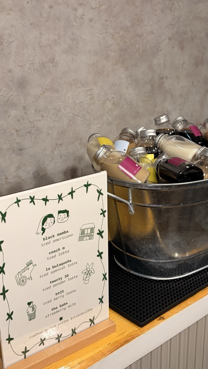 custom menu card next to an ice bucket of bottles
